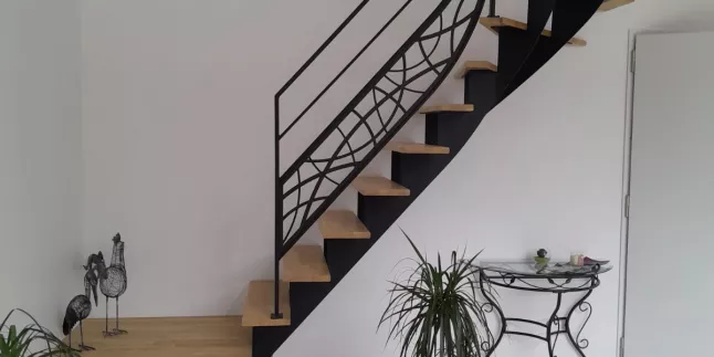 Escalier double limons crémaillère cintrée en acier